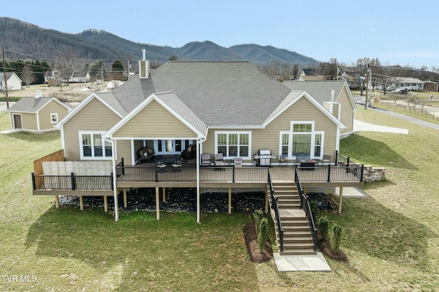 132 Hamilton Rd, Elizabethton, TN 37643 - rear view of property featuring an outdoor hangout area, a yard, and a deck with mountain view