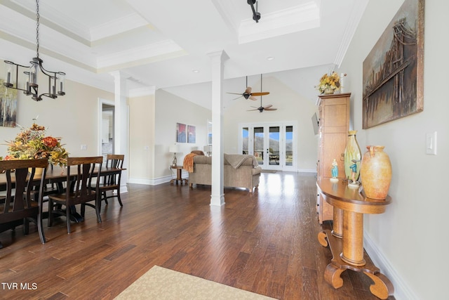 132 Hamilton Rd, Elizabethton, TN 37643 - dining area featuring a tray ceiling, ornamental molding, decorative columns, and dark wood-type flooring