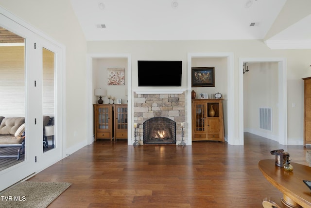 132 Hamilton Rd, Elizabethton, TN 37643 - living room featuring dark wood-type flooring, a fireplace, and vaulted ceiling