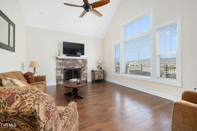 132 Hamilton Rd, Elizabethton, TN 37643 - living room with ceiling fan, dark hardwood / wood-style flooring, high vaulted ceiling, and a stone fireplace