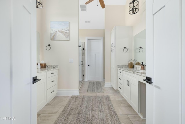 132 Hamilton Rd, Elizabethton, TN 37643 - bathroom featuring vanity, ceiling fan, and walk in shower