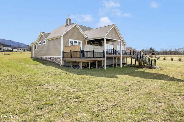132 Hamilton Rd, Elizabethton, TN 37643 - rear view of house featuring a wooden deck and a lawn