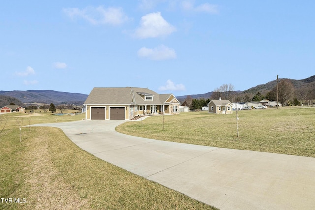 132 Hamilton Rd, Elizabethton, TN 37643 - view of front facade with a garage, a mountain view, and a front lawn