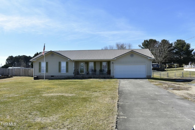 single story home featuring a garage and a front yard