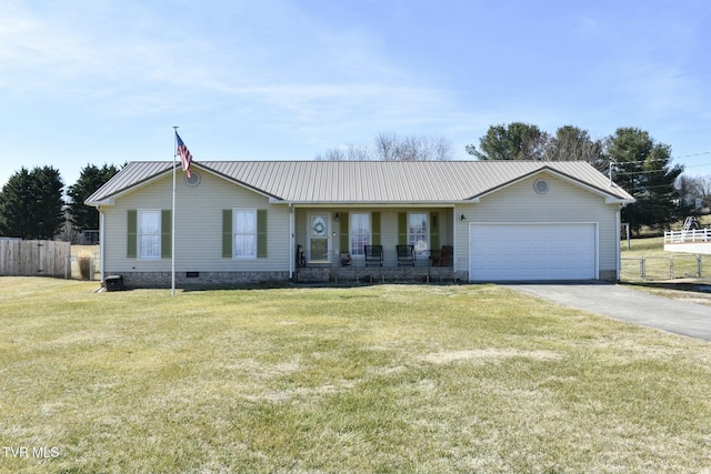 single story home featuring a garage and a front lawn