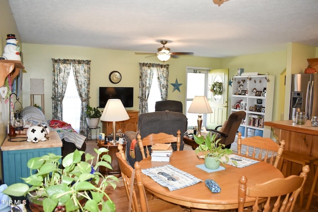 dining area with ceiling fan