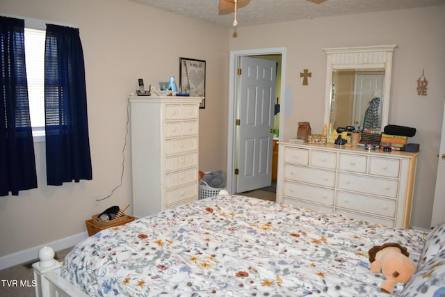 bedroom featuring a textured ceiling