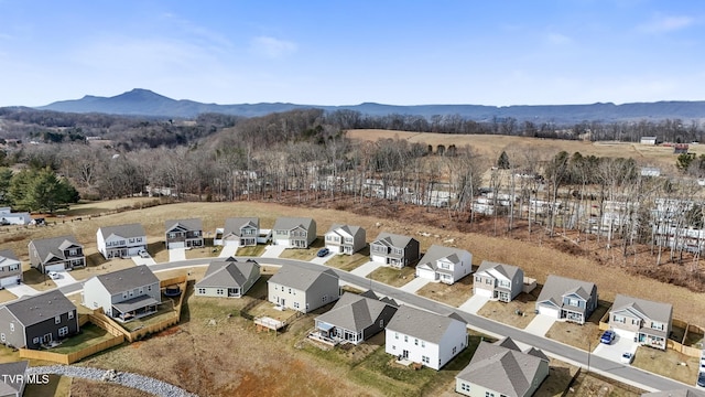 drone / aerial view featuring a mountain view