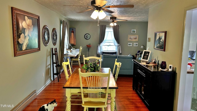 dining room with dark hardwood / wood-style flooring, ceiling fan, a textured ceiling, and baseboard heating