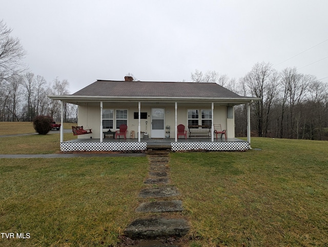 3645 Dc Caney Ridge Rd, Clintwood, VA 24228 - farmhouse inspired home with covered porch and a front lawn