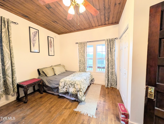 bedroom featuring crown molding, ceiling fan, hardwood / wood-style floors, and wooden ceiling