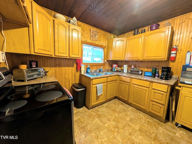 kitchen with sink, range with electric stovetop, wooden walls, and wooden ceiling