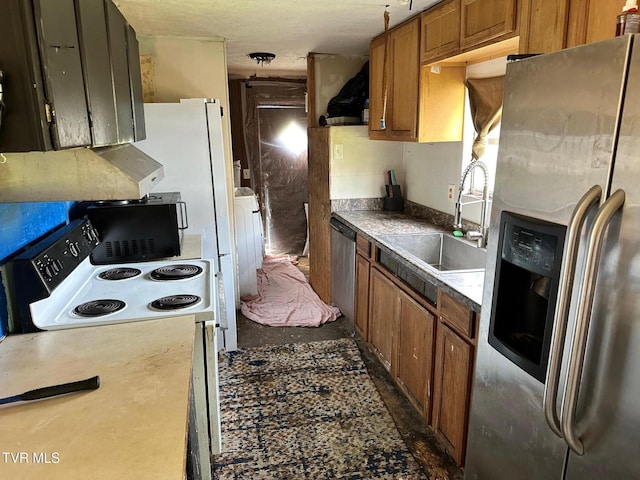 kitchen with appliances with stainless steel finishes and sink