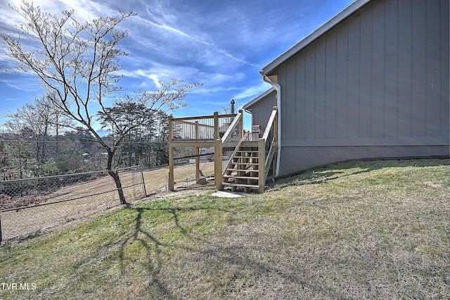 view of yard featuring a wooden deck