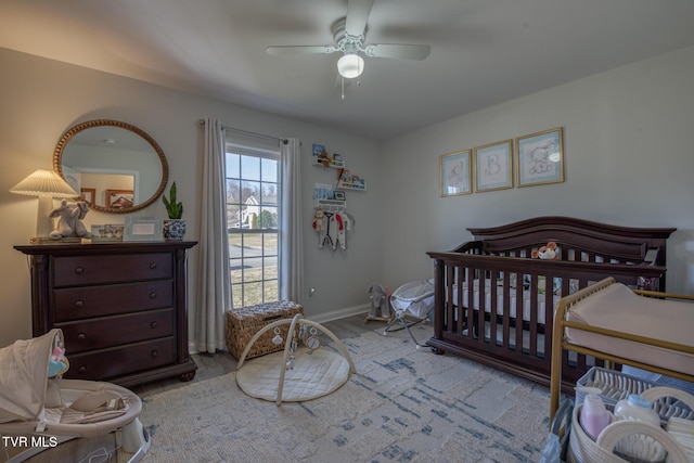 bedroom with ceiling fan and light hardwood / wood-style floors