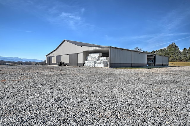 view of outdoor structure with a mountain view