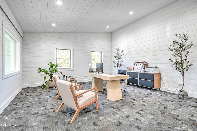 carpeted office featuring lofted ceiling and wooden ceiling