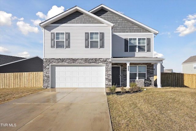 view of front facade with a garage and a front lawn