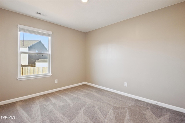 view of carpeted spare room