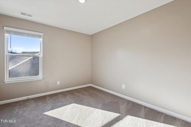 view of carpeted spare room