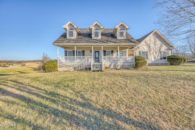 view of front facade with a front lawn and a porch