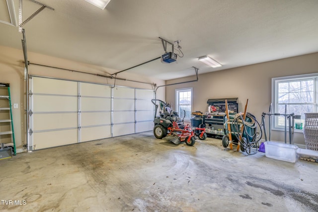 garage featuring a garage door opener