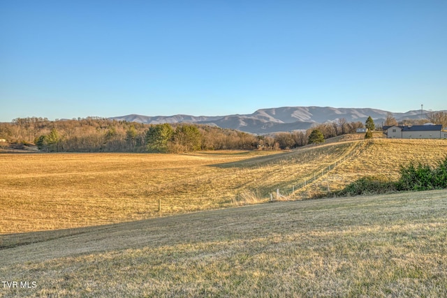 property view of mountains featuring a rural view