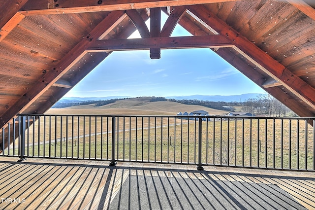 wooden terrace featuring a mountain view