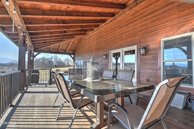 wooden terrace featuring a mountain view