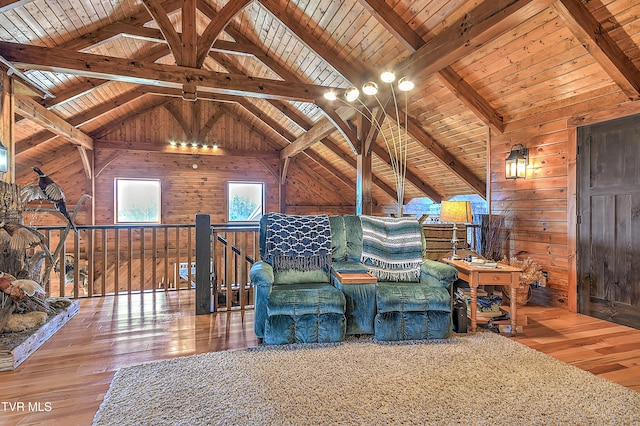 interior space with lofted ceiling with beams, hardwood / wood-style floors, wood ceiling, and wood walls