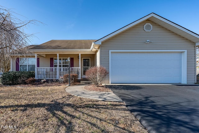 single story home featuring a garage and covered porch