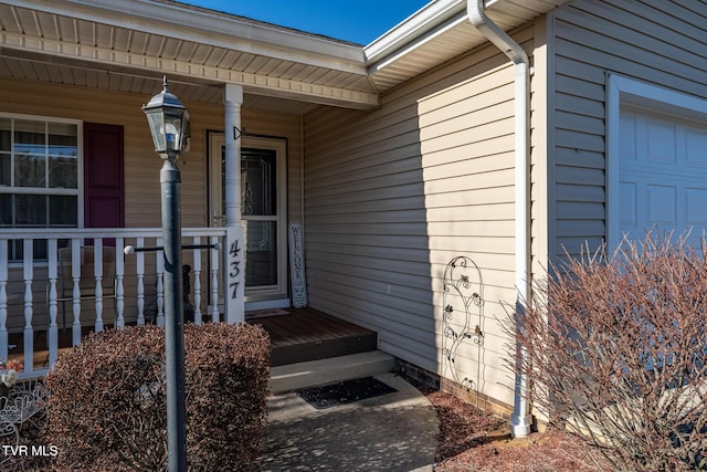 entrance to property featuring a garage