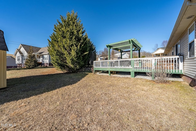 view of yard with a deck