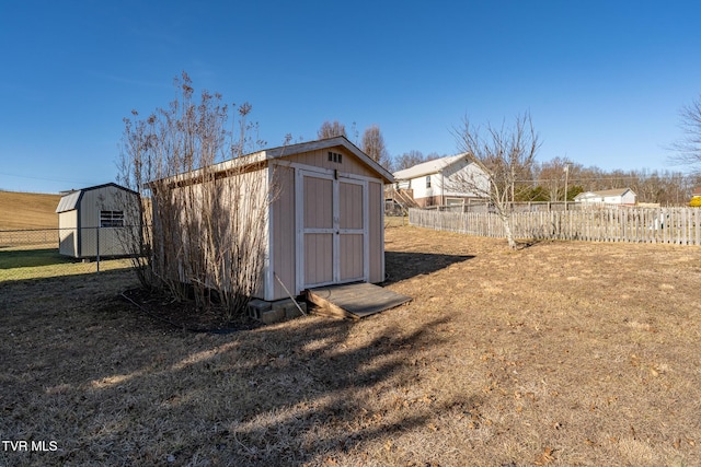 view of outbuilding featuring a lawn