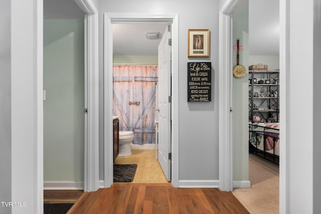 hall featuring light wood-type flooring