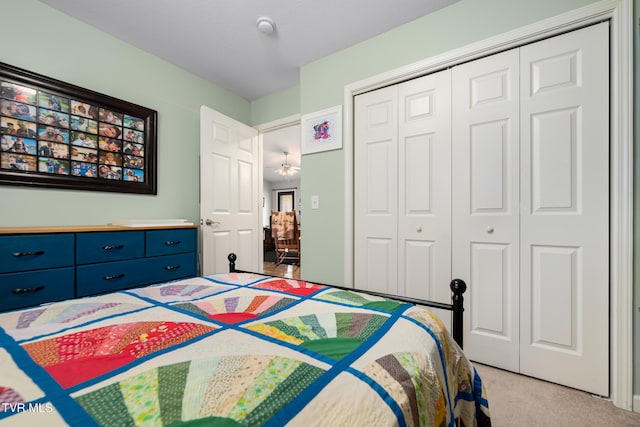 carpeted bedroom with a closet