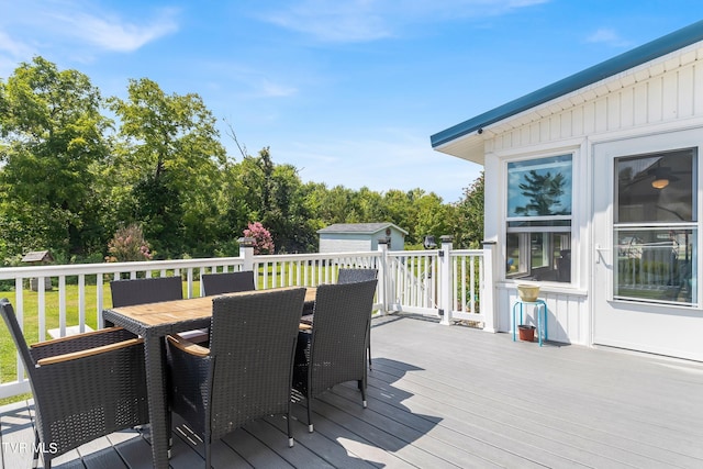 wooden terrace with a storage unit