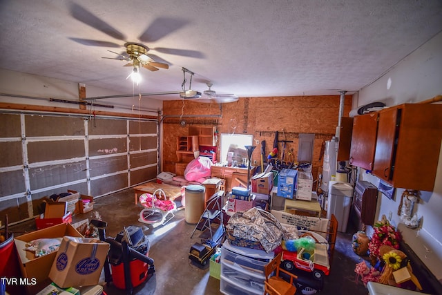 garage featuring ceiling fan and a garage door opener