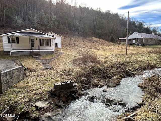 view of yard with a porch