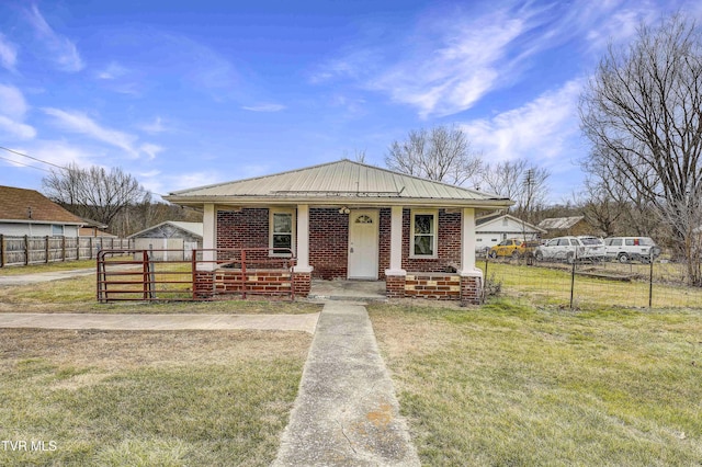 bungalow-style home featuring a porch and a front lawn