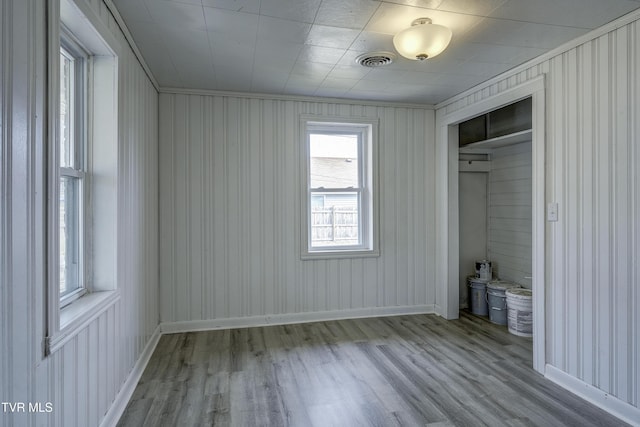 unfurnished bedroom featuring light wood-type flooring