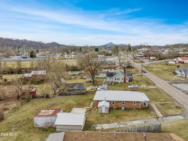 drone / aerial view featuring a mountain view