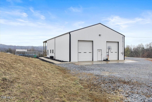 view of outbuilding featuring a garage