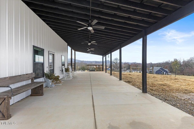 view of patio with ceiling fan