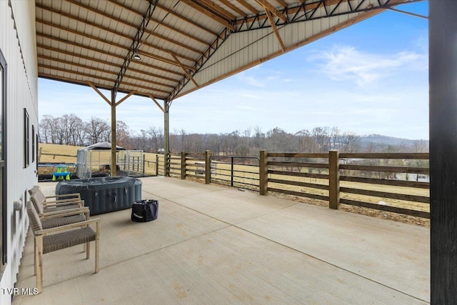 view of patio with a hot tub