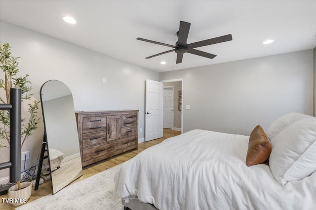 bedroom featuring ceiling fan and light wood-type flooring