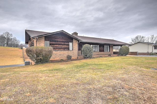 ranch-style home with a front yard