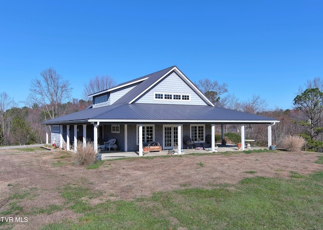 farmhouse-style home with a patio area