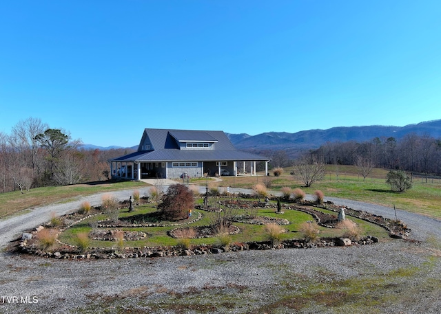 farmhouse inspired home featuring a mountain view