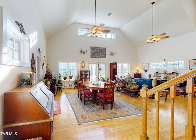 dining space with ceiling fan, plenty of natural light, and light hardwood / wood-style floors